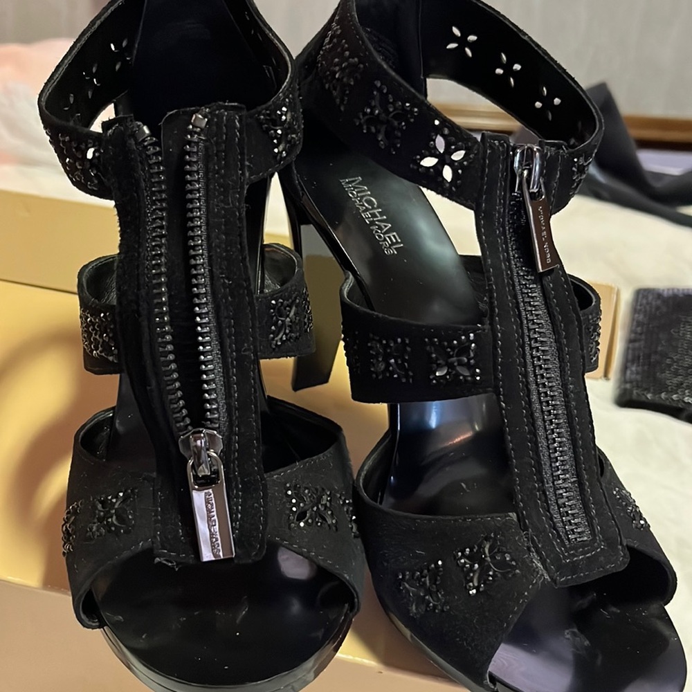 Michael Kors . Berkeley zip front high heel sanders.
